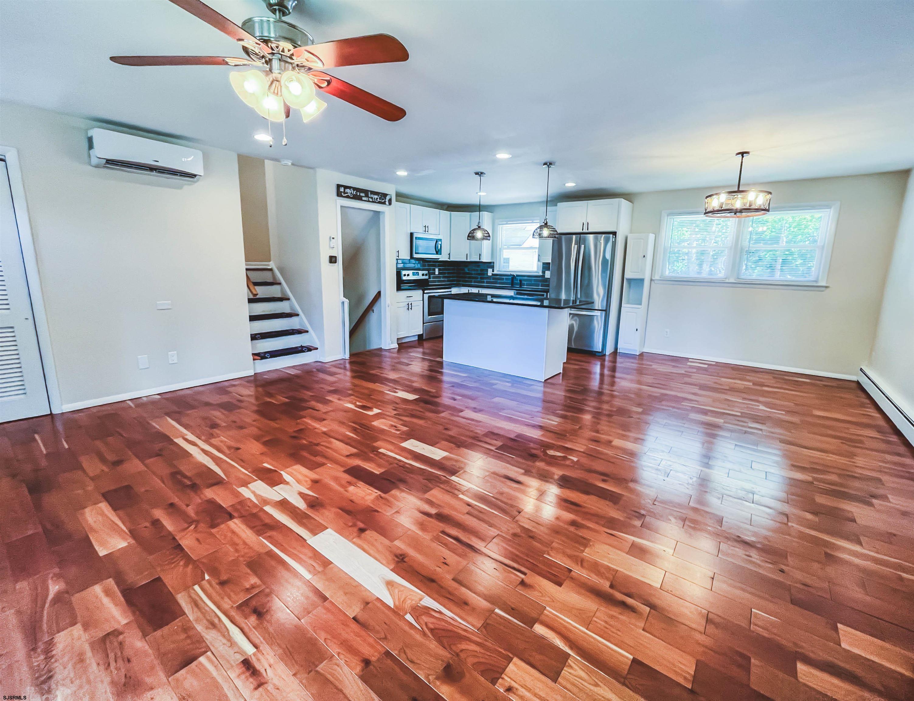 518 Delaware Avenue Absecon, NJ 08201 - Photo 4 of 38 a view of kitchen and hall with wooden floor