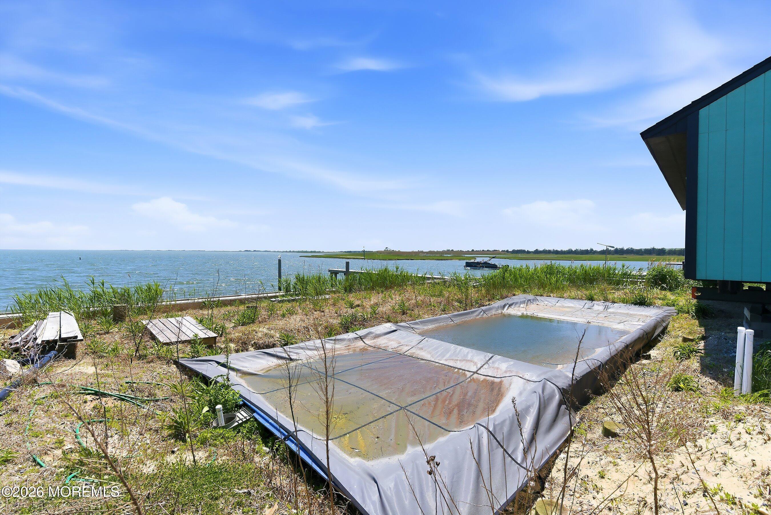 48 Parker Road Tuckerton, NJ 08087 - Photo 23 of 35 a view of a terrace with chairs