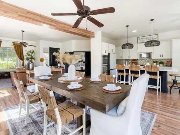 a view of a dining room with furniture