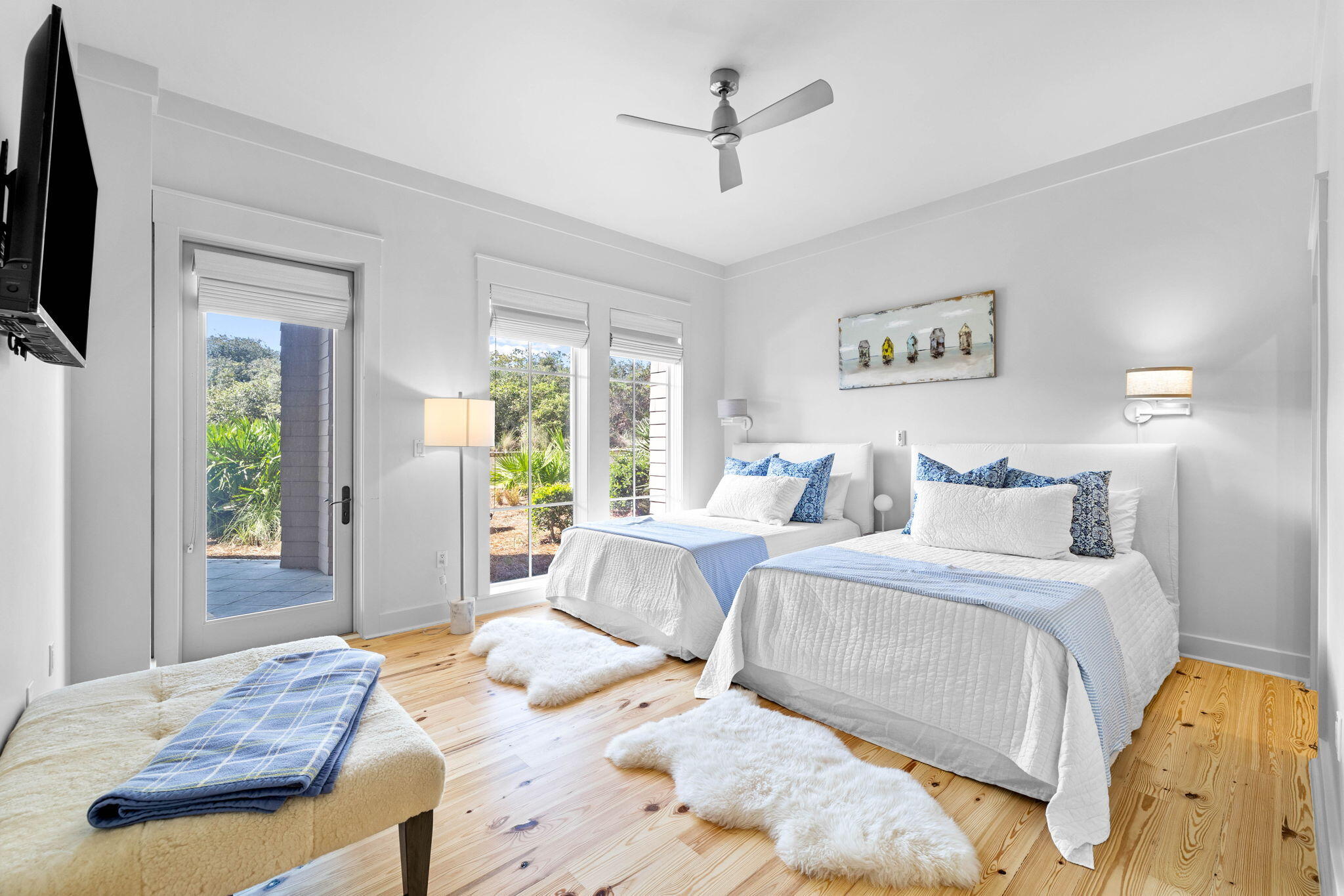 37 Compass Point Way South, Unit 107 Inlet Beach, FL 32461 - Photo 29 of 40 a bedroom with a bed flat screen tv and a large window