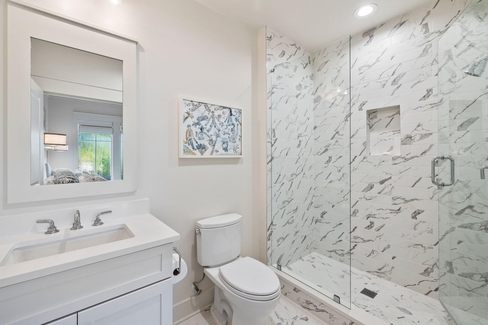 37 Compass Point Way South, Unit 107 Inlet Beach, FL 32461 - Photo 31 of 40 a bathroom with a toilet sink vanity and mirror