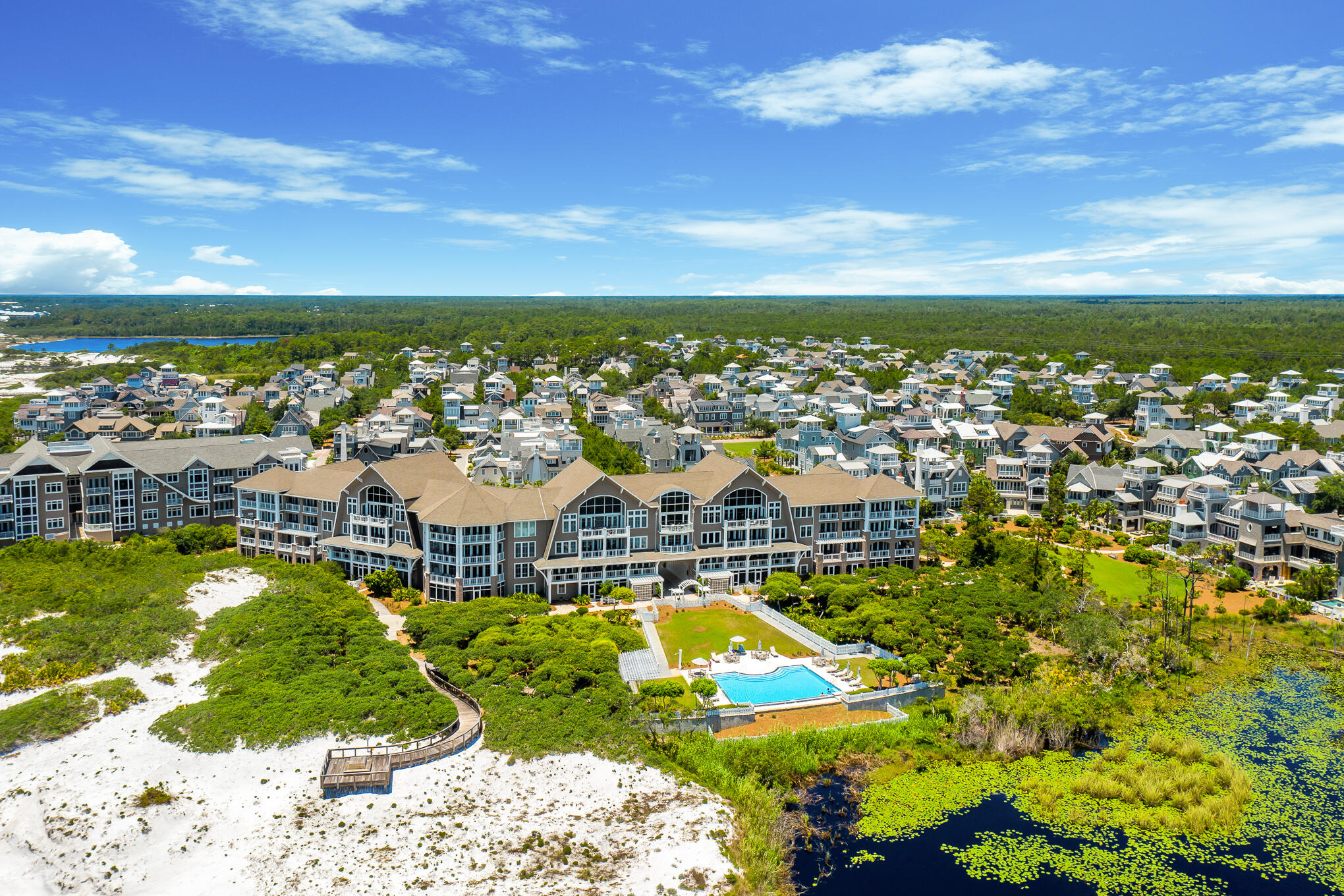 37 Compass Point Way South, Unit 107 Inlet Beach, FL 32461 - Photo 35 of 40 a view of a city with lawn chairs