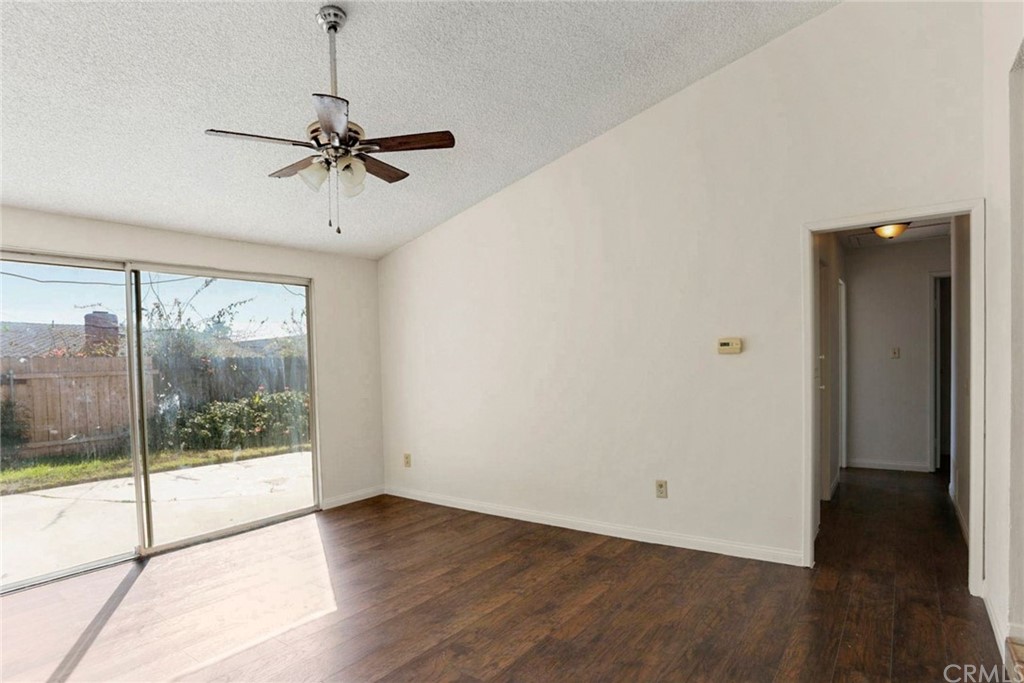 340 Maravilla Drive Riverside, CA 92507 - Photo 23 of 35 a view of a room with wooden floor and windows