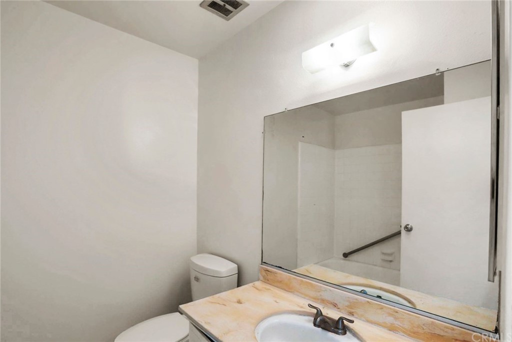 340 Maravilla Drive Riverside, CA 92507 - Photo 29 of 35 a bathroom with a sink and a toilet