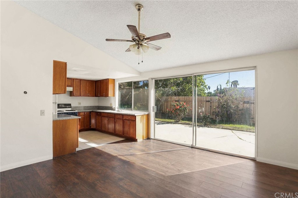 340 Maravilla Drive Riverside, CA 92507 - Photo 8 of 35 a large kitchen with a counter space a sink and cabinets