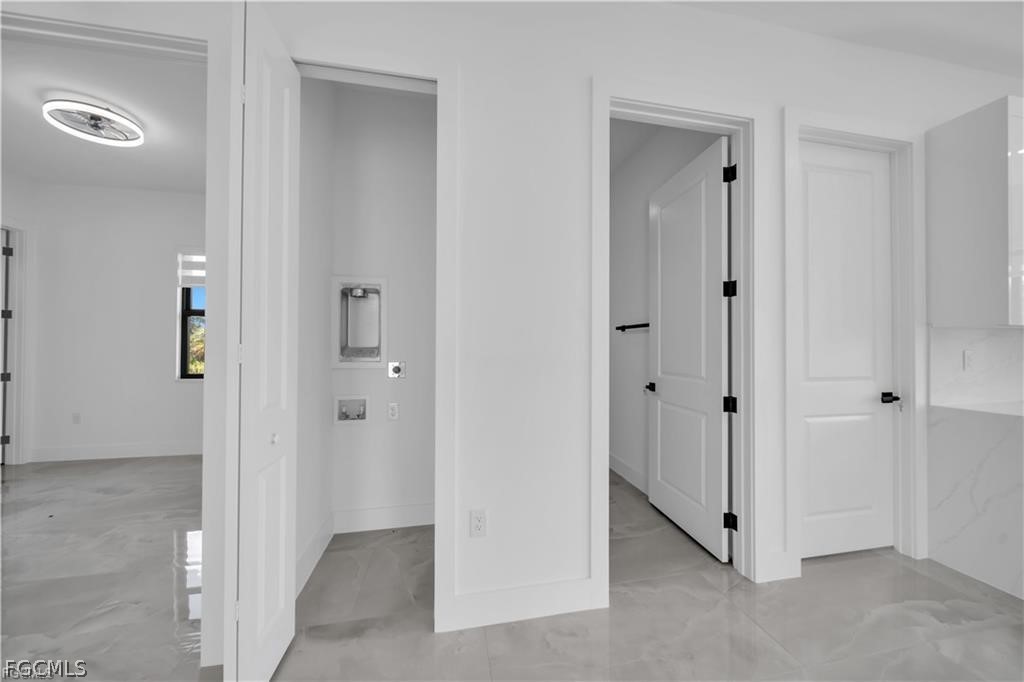 711 Roma Avenue South Lehigh Acres, FL 33974 - Photo 14 of 38 a view of an empty room with closet and mirror