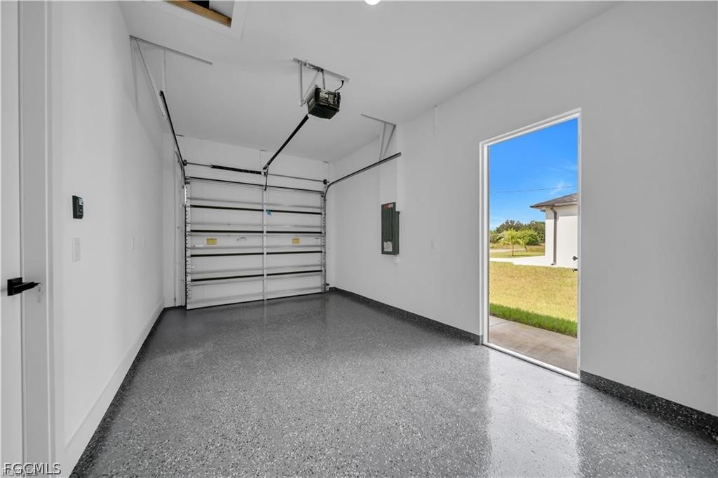 711 Roma Avenue South Lehigh Acres, FL 33974 - Photo 23 of 38 a view of room with stairs and a window