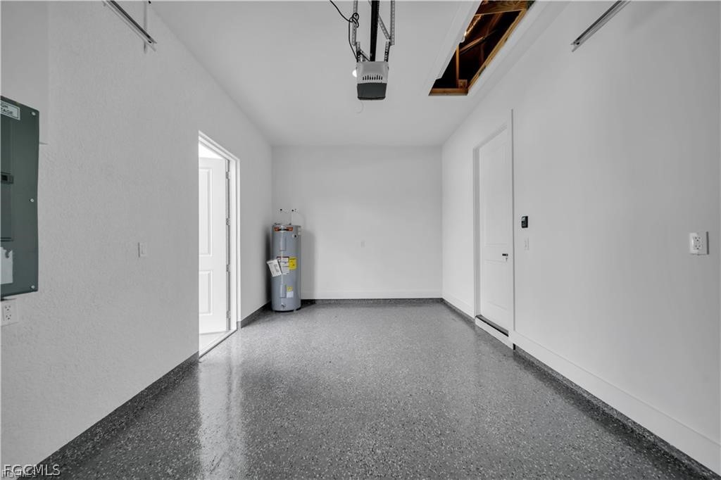 711 Roma Avenue South Lehigh Acres, FL 33974 - Photo 24 of 38 a view of a room with white walls