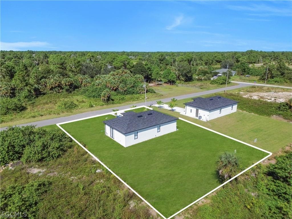 711 Roma Avenue South Lehigh Acres, FL 33974 - Photo 31 of 38 a view of a tennis court