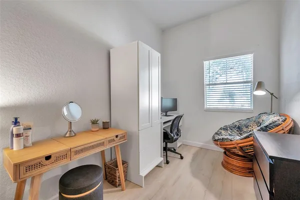 a room with a washing machine and sink