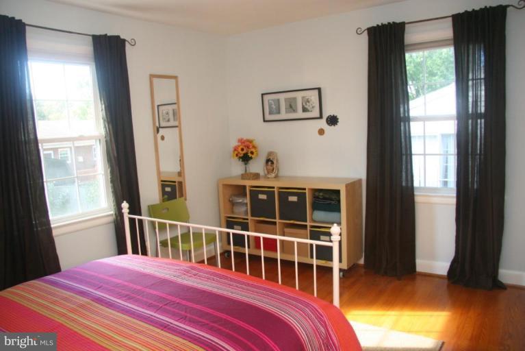 1706 Donald Place Silver Spring, MD 20902 - Photo 14 of 30 a bedroom with a bed and a window