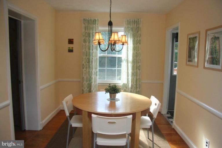 1706 Donald Place Silver Spring, MD 20902 - Photo 5 of 30 a dining room with furniture and window