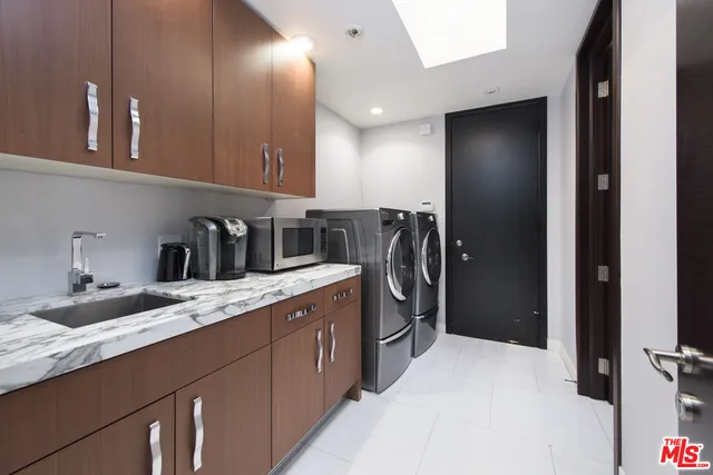 a view of a backyard with sitting area