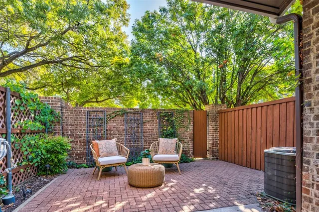 a backyard of a house with seating space