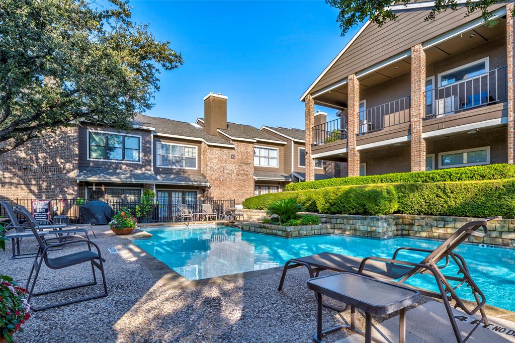 5859 Frankford Road, Unit 107 Dallas, TX 75252 - Photo 33 of 37 a front view of a house with garden and sitting area