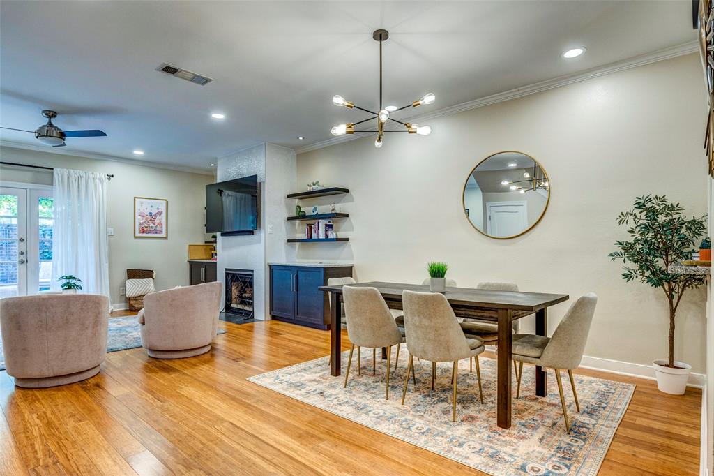 5859 Frankford Road, Unit 107 Dallas, TX 75252 - Photo 5 of 37 a view of a dining room with furniture and a rug