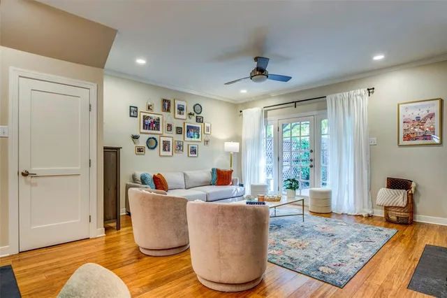 a living room with furniture and a rug