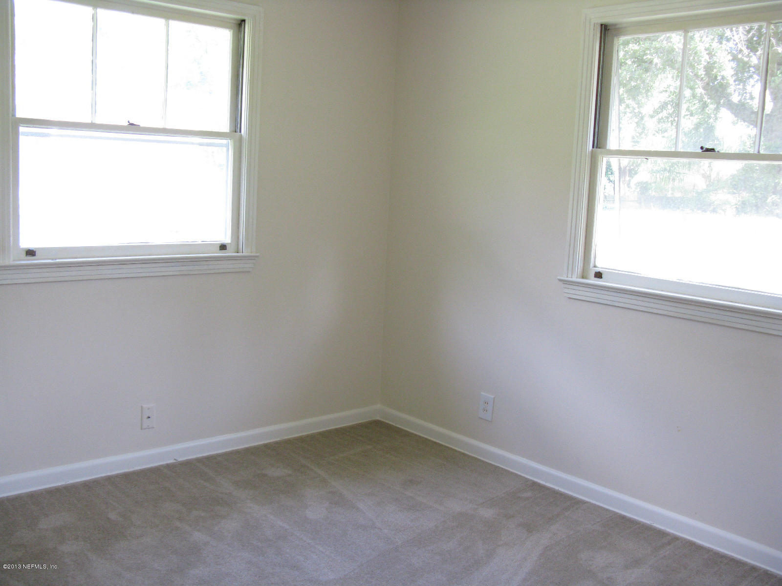 6641 Ector Road Jacksonville, FL 32211 - Photo 12 of 15 an empty room with a window