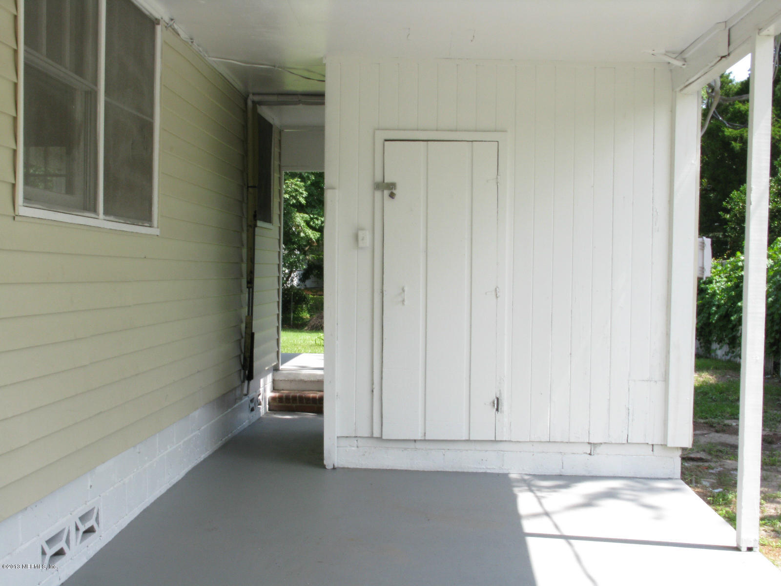 6641 Ector Road Jacksonville, FL 32211 - Photo 15 of 15 a view of an empty room with a window