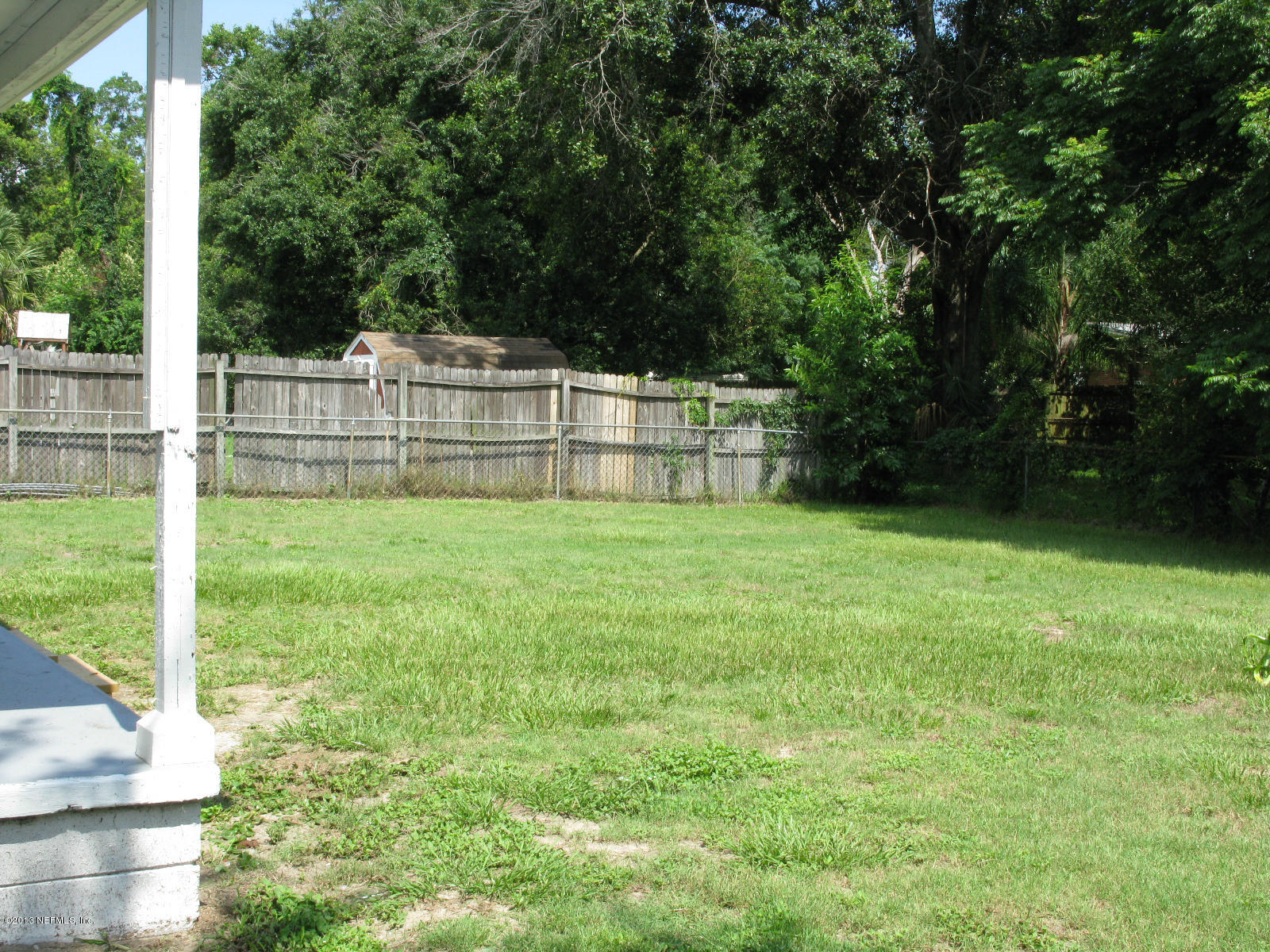 6641 Ector Road Jacksonville, FL 32211 - Photo 4 of 15 a view of a deck with a bench
