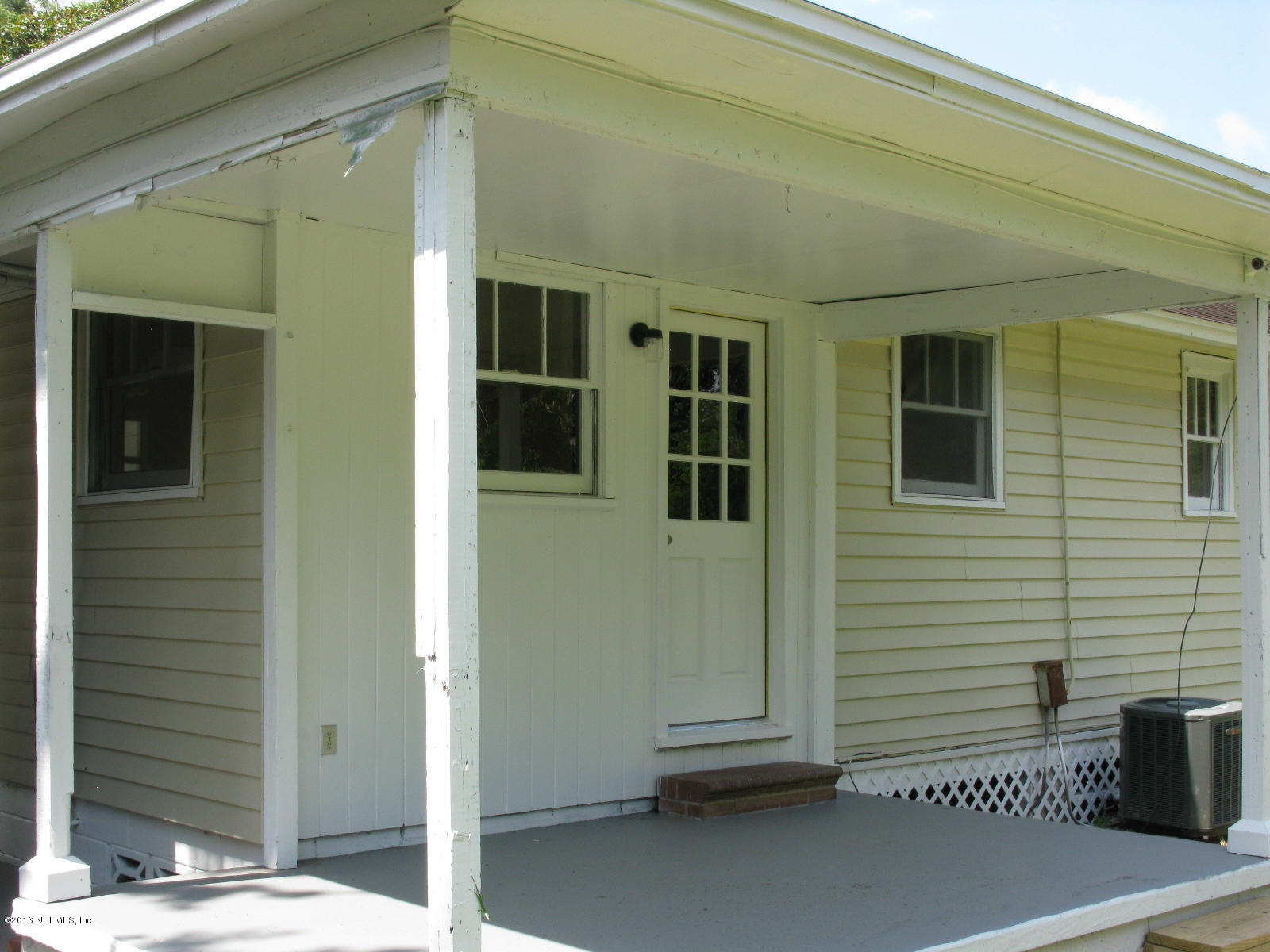 6641 Ector Road Jacksonville, FL 32211 - Photo 5 of 15 a view of a door and a window