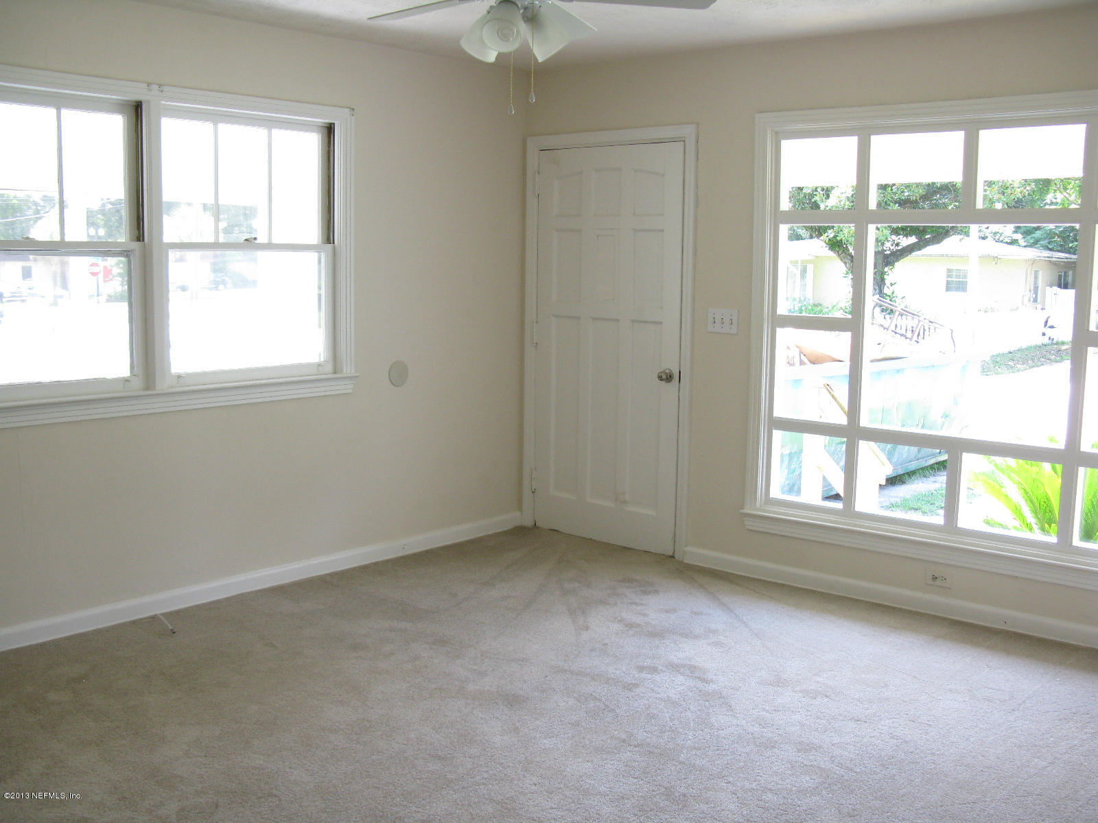 6641 Ector Road Jacksonville, FL 32211 - Photo 6 of 15 an empty room with a window