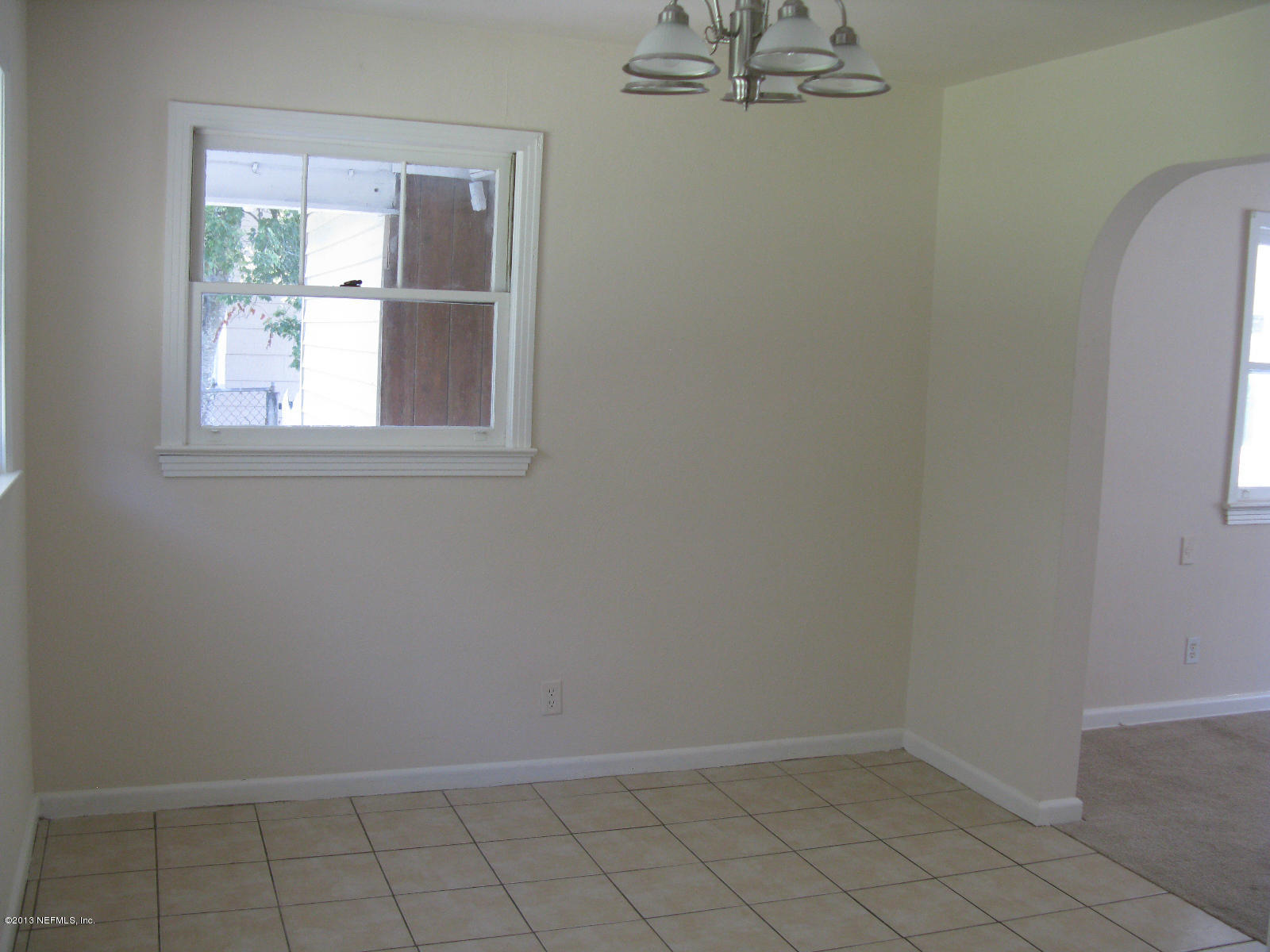 6641 Ector Road Jacksonville, FL 32211 - Photo 7 of 15 an empty room with windows