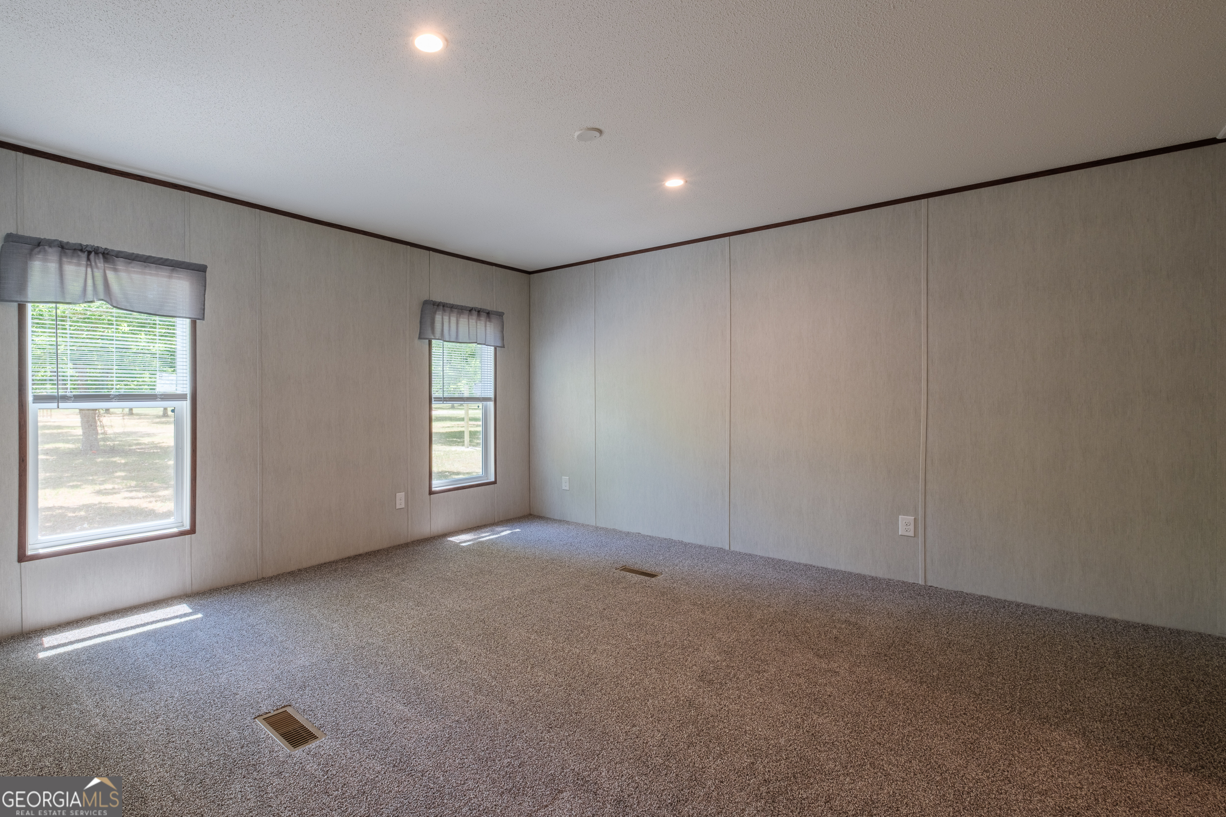 2959 Lake Lannell Road Odum, GA 31555 - Photo 14 of 30 an empty room with windows
