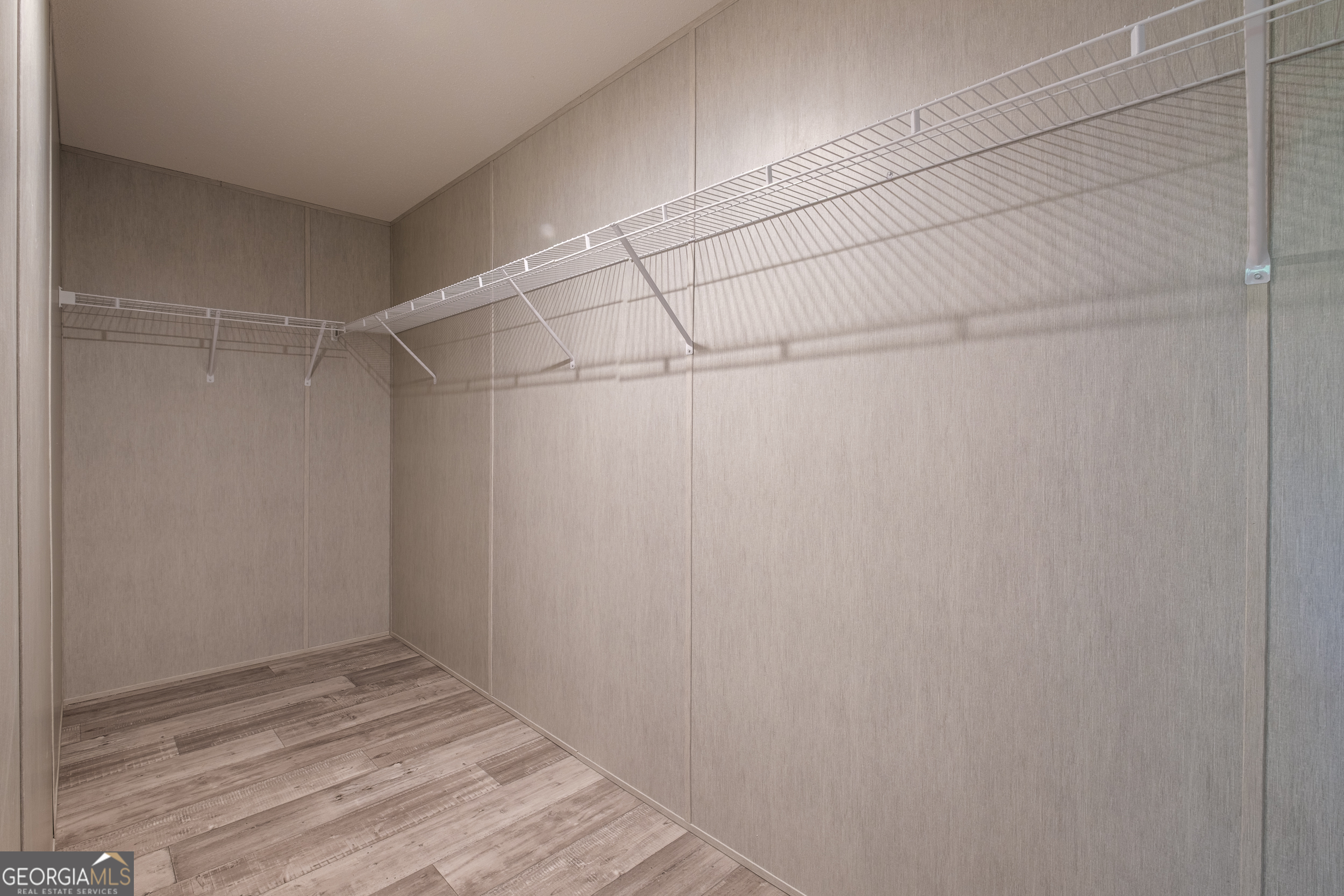 2959 Lake Lannell Road Odum, GA 31555 - Photo 18 of 30 a view of a room with empty racks