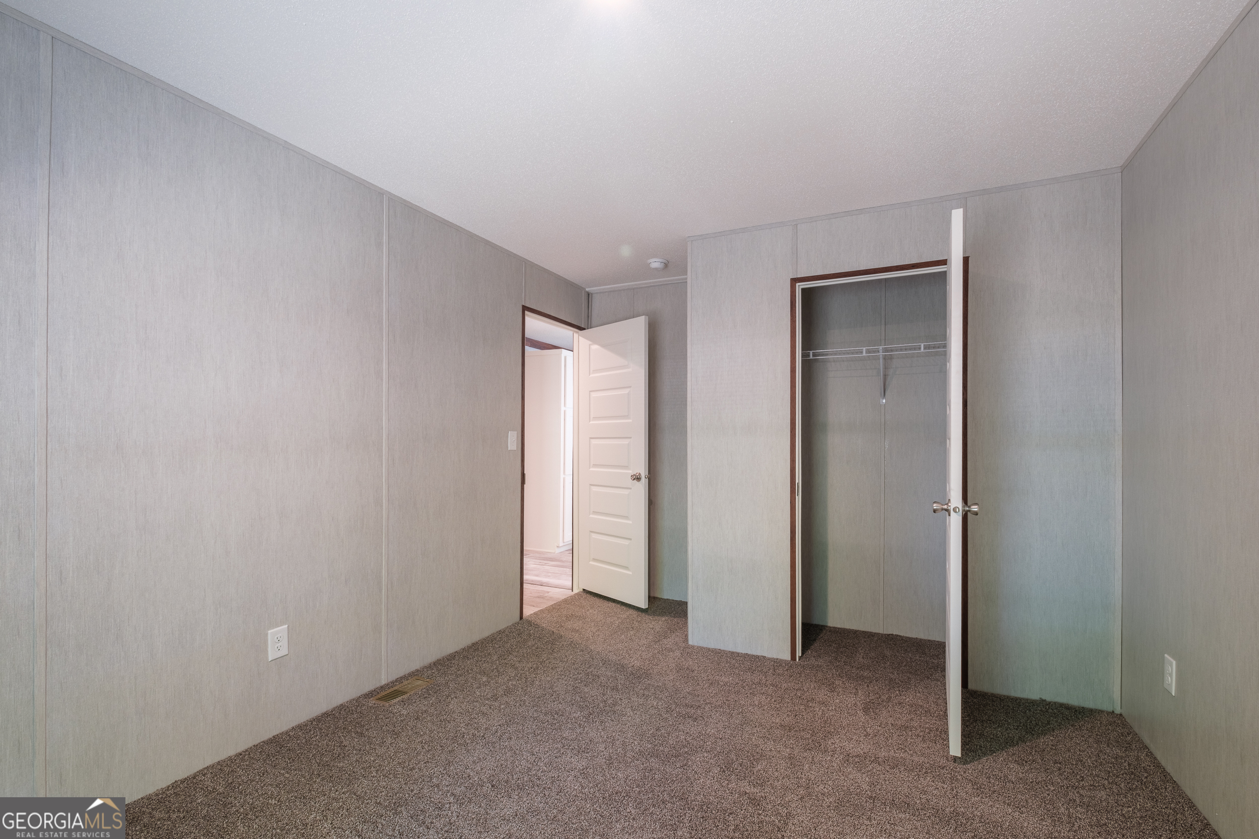 2959 Lake Lannell Road Odum, GA 31555 - Photo 25 of 30 a view of an empty room and closet area