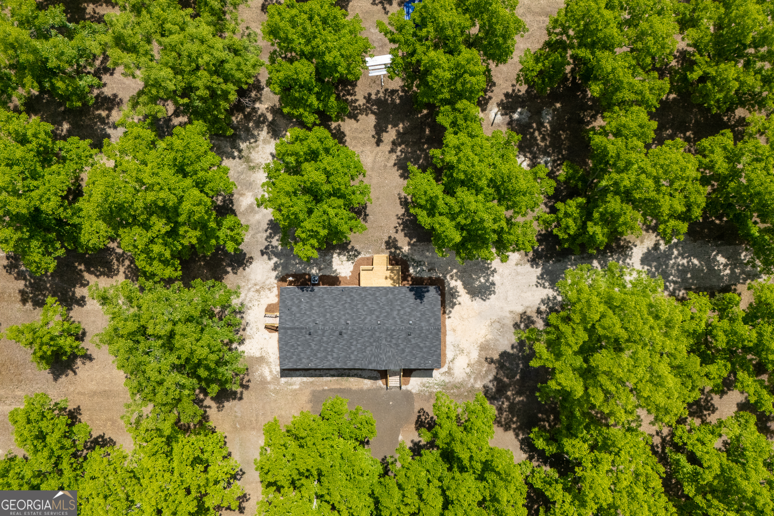 2959 Lake Lannell Road Odum, GA 31555 - Photo 28 of 30 an aerial view of a house with a yard and lake view