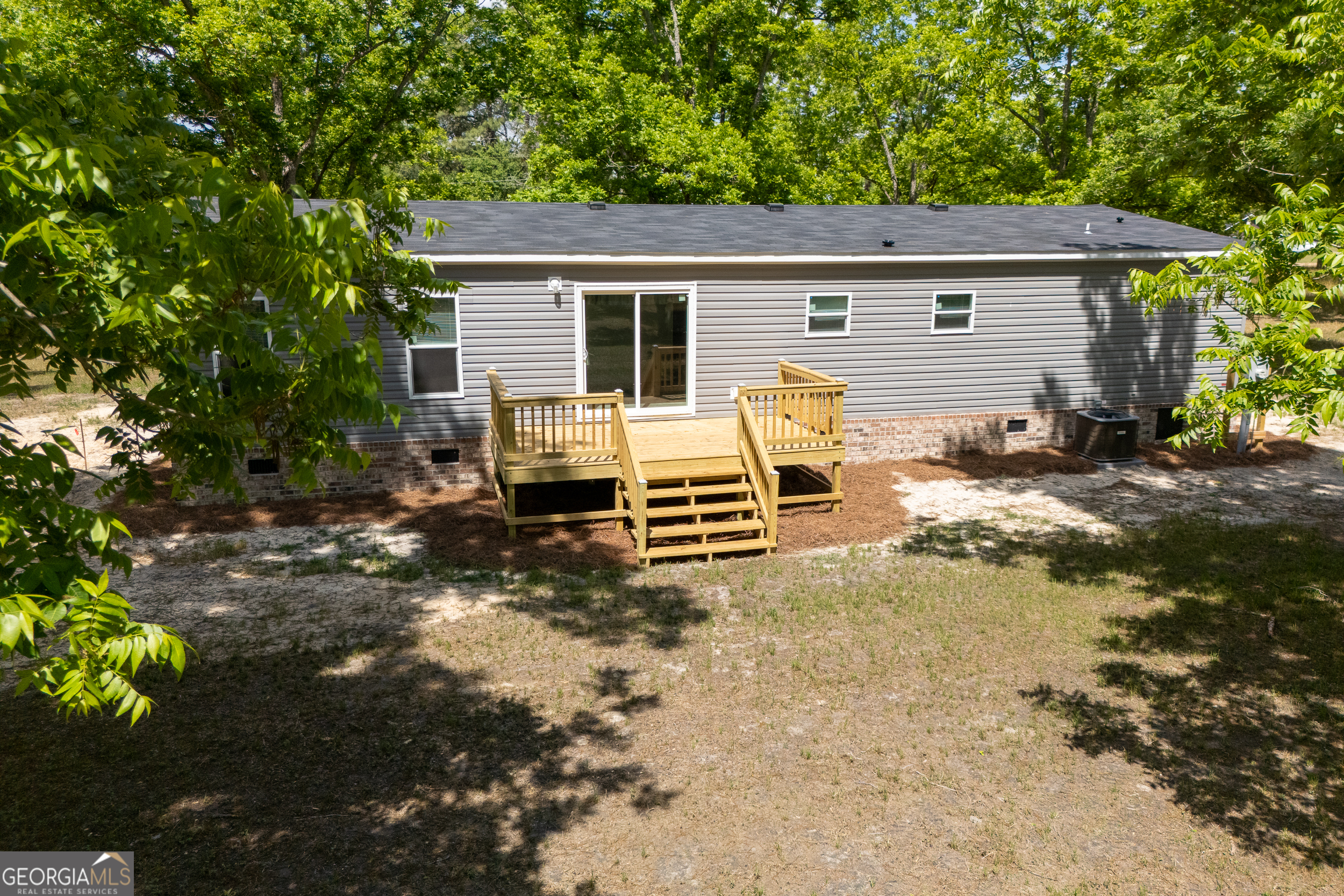 2959 Lake Lannell Road Odum, GA 31555 - Photo 4 of 30 a view of backyard of the house