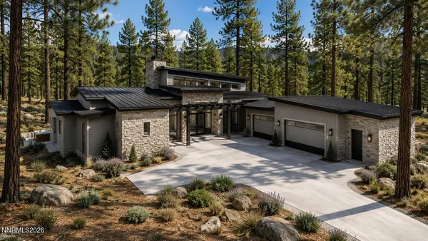 a view of a house with a yard and garage