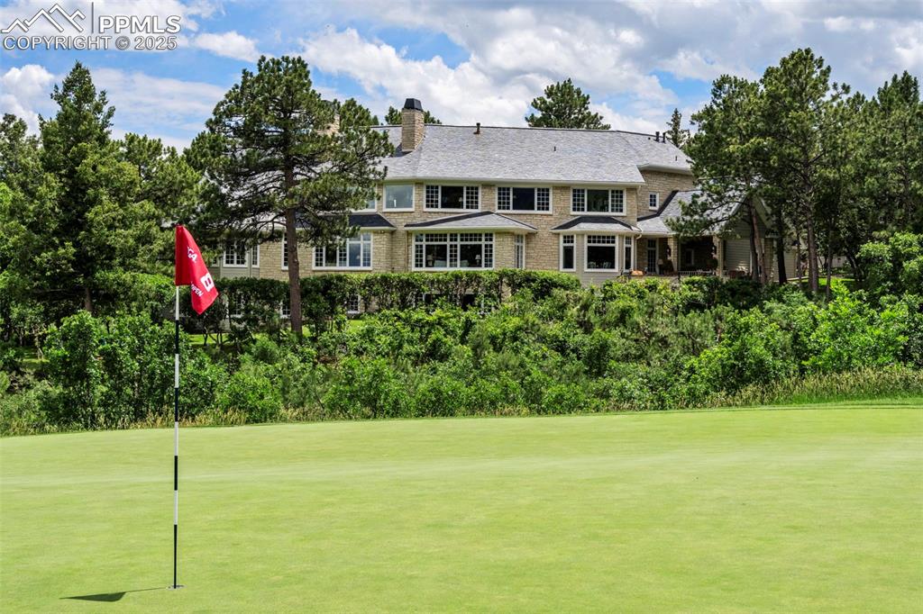 104 Marland Road Colorado Springs, CO 80906 - Photo 2 of 50 a front view of a house with a yard