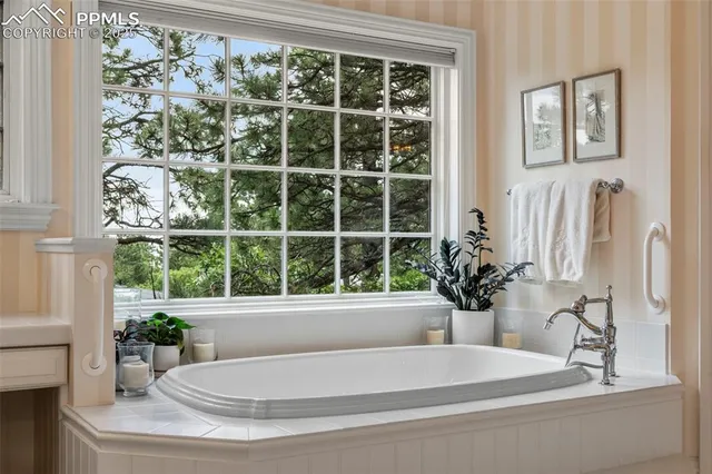 a view of a bath tub sitting in a bathroom