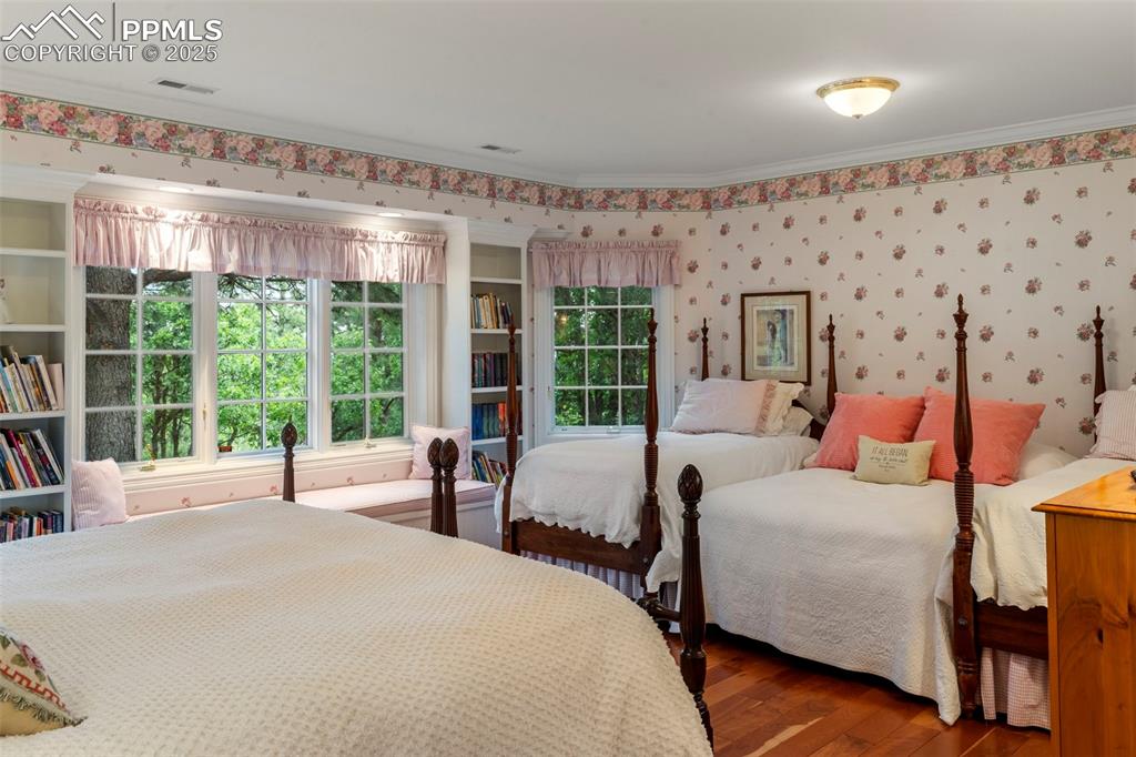 104 Marland Road Colorado Springs, CO 80906 - Photo 40 of 50 a bedroom with bed and large windows