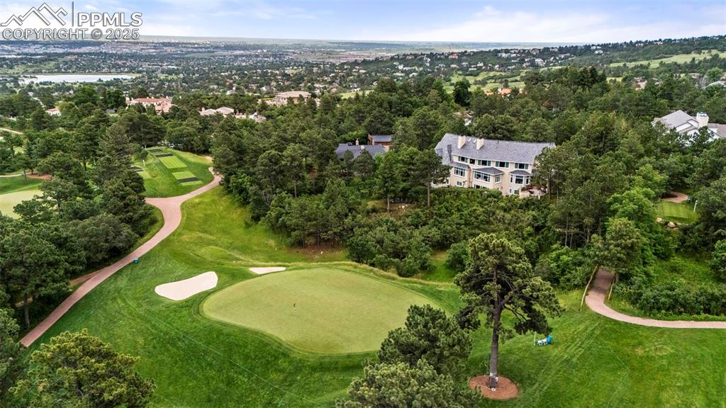 104 Marland Road Colorado Springs, CO 80906 - Photo 48 of 50 a view of a house with a yard and lake view