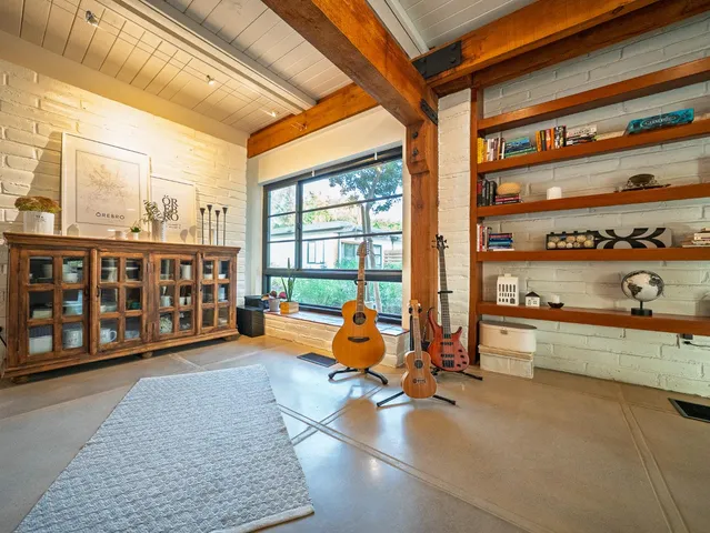 a room with granite countertop lots of counter top space