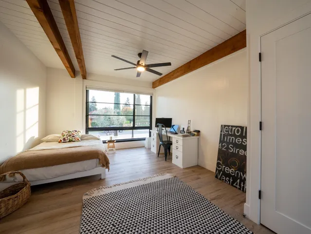 a view of front door and potted plants