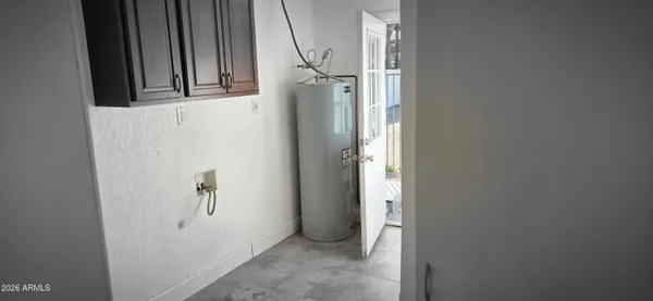 a view of balcony with wooden floor