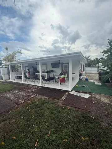 a childrens park with lots of swings and slides