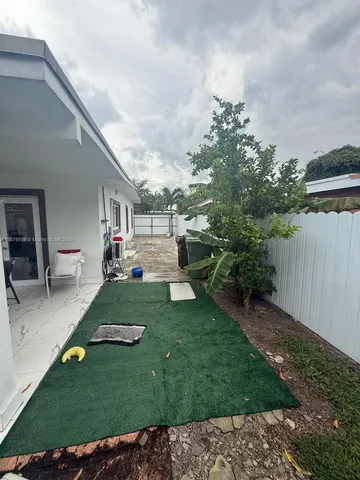 a view of a house with a swimming pool