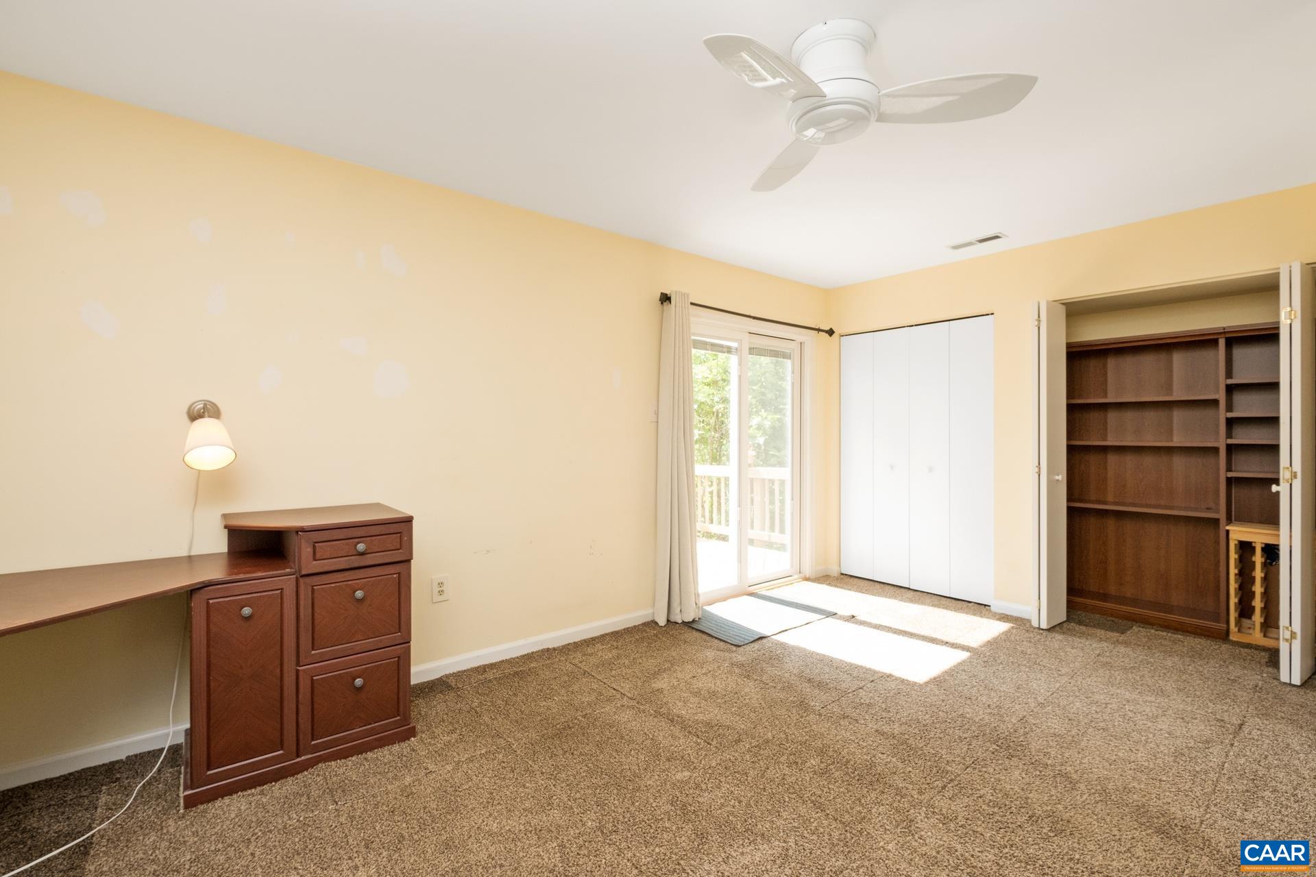 326 Riverside Avenue Charlottesville, VA 22902 - Photo 11 of 38 a view of a bedroom with closet and cabinet