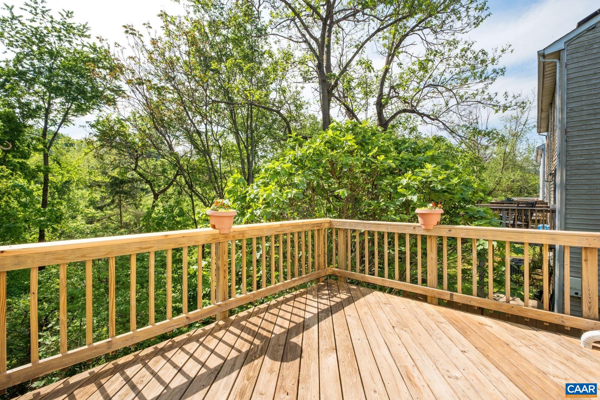 326 Riverside Avenue Charlottesville, VA 22902 - Photo 14 of 38 a view of balcony with wooden floor and fence