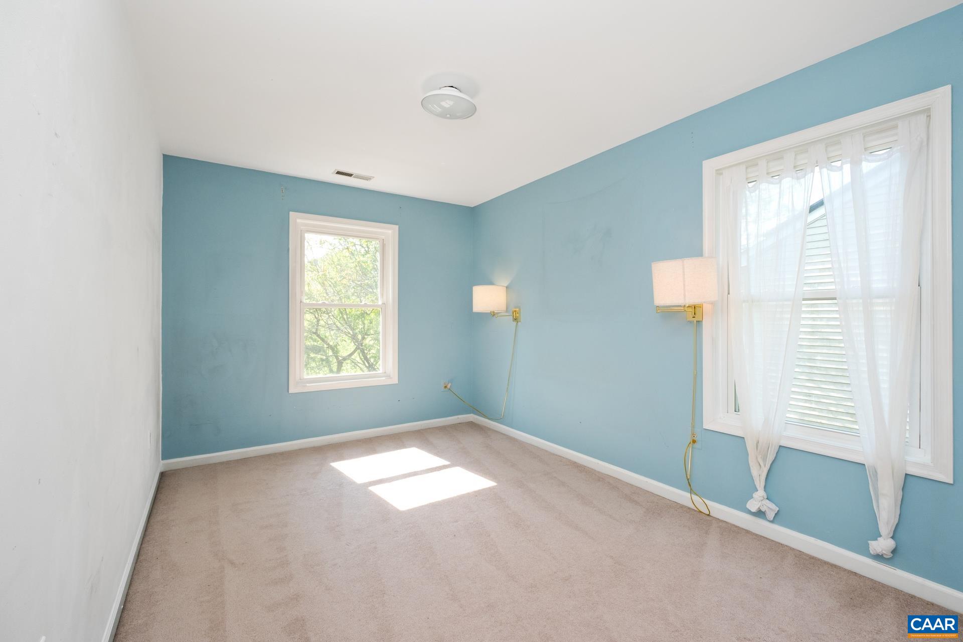 326 Riverside Avenue Charlottesville, VA 22902 - Photo 17 of 38 a view of an empty room with a window