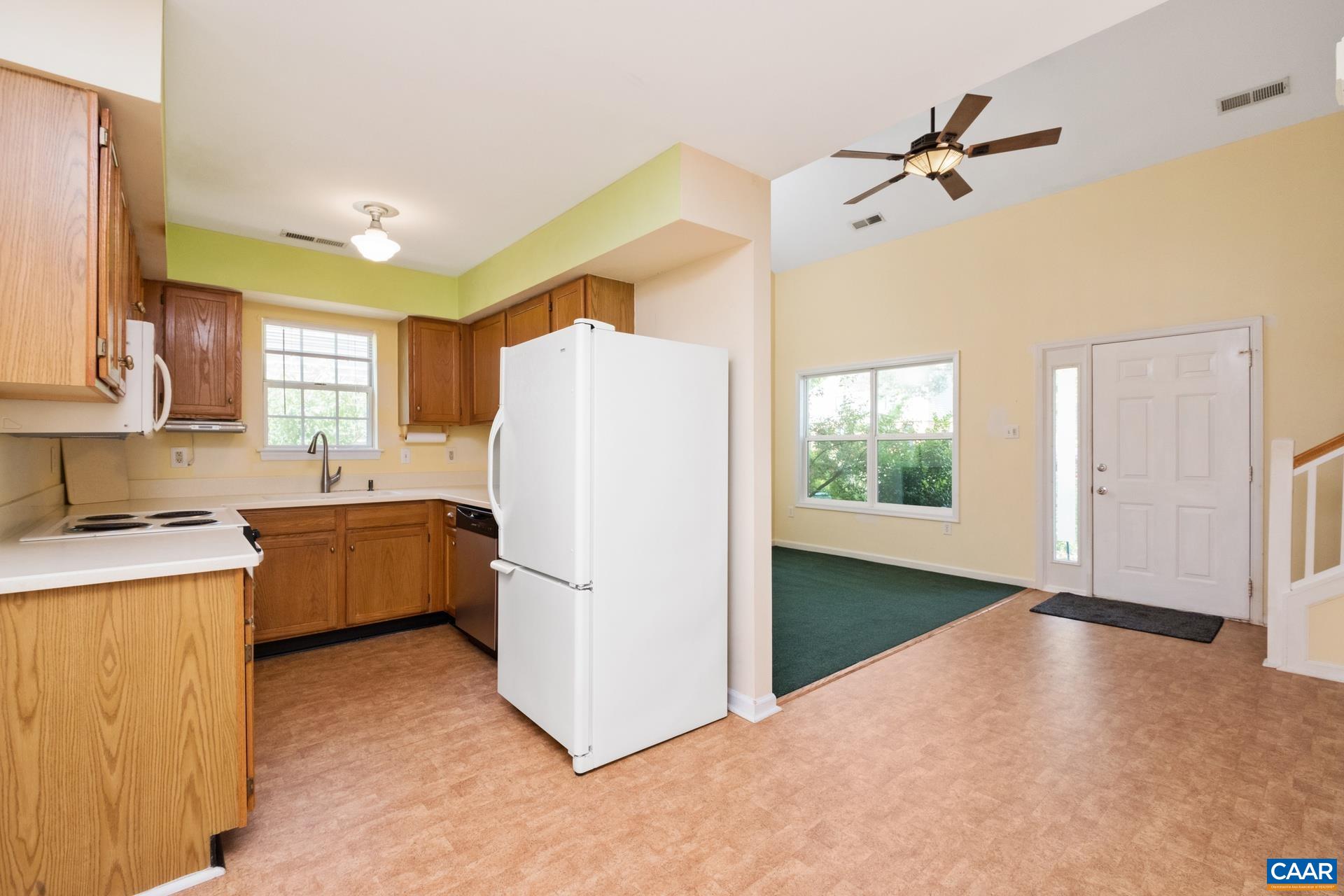 326 Riverside Avenue Charlottesville, VA 22902 - Photo 8 of 38 a kitchen with a refrigerator a stove top oven a sink and dishwasher