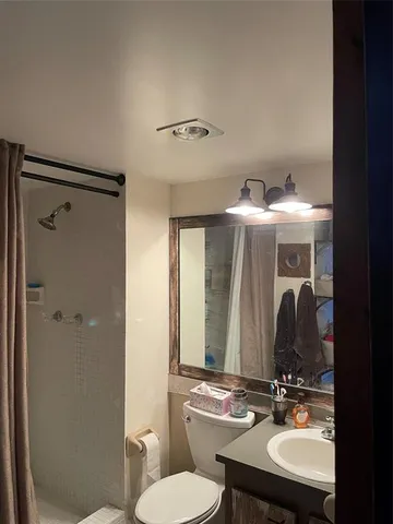 a view of a swimming pool with a yard