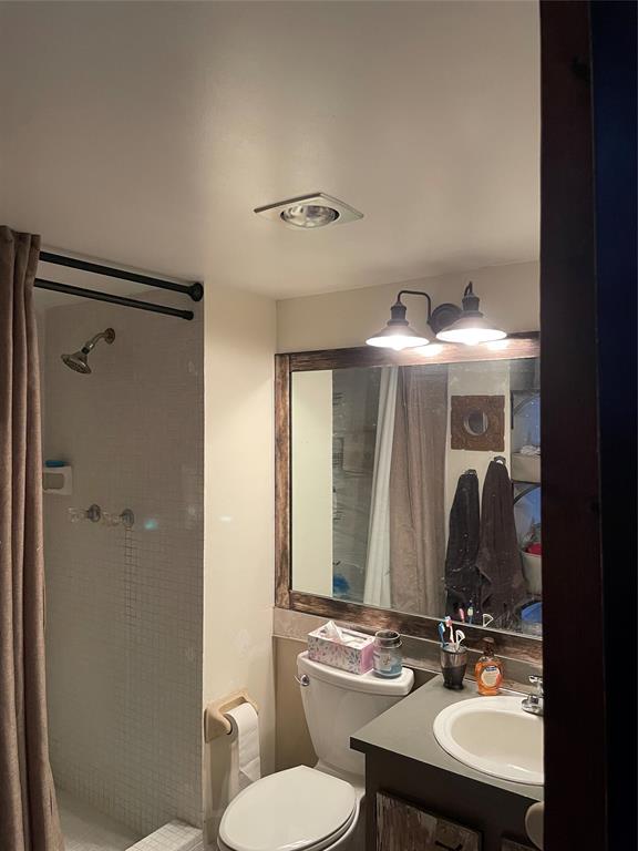 8838 West McNab Road, Unit 201 Tamarac, FL 33321 - Photo 16 of 20 a bathroom with a sink toilet and shower