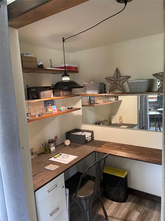 8838 West McNab Road, Unit 201 Tamarac, FL 33321 - Photo 3 of 20 a kitchen with a sink a stove and wooden floor
