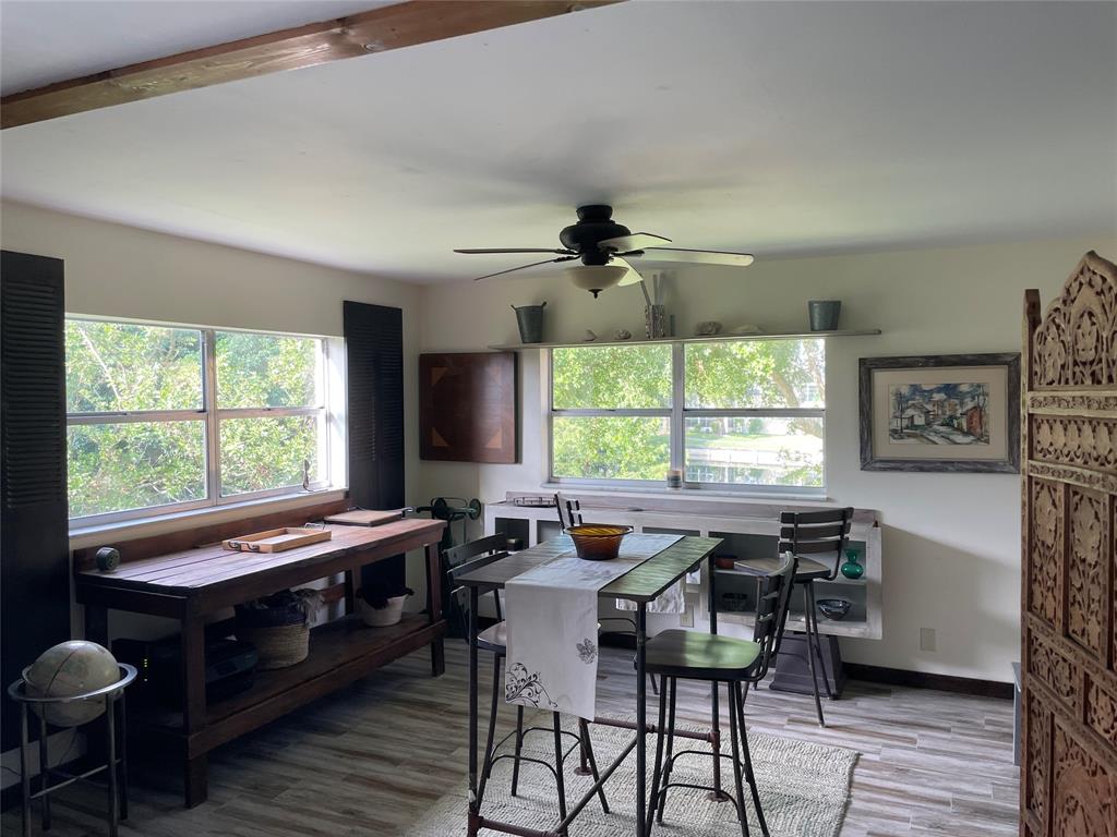 8838 West McNab Road, Unit 201 Tamarac, FL 33321 - Photo 6 of 20 a view of a dining room with furniture window and outside view